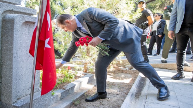 Başkan Tugay'dan şehitlerin kabrine karanfil